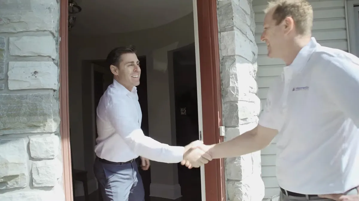 Magnetite technician greeting client